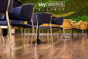 Reupholstered yellow sofa at Sky Studios Elstree
