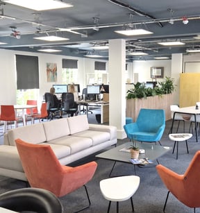 Lounge seating and open-plan office at the Hertfordshire Chamber of Commerce, designed and furnished by JPA Workspaces